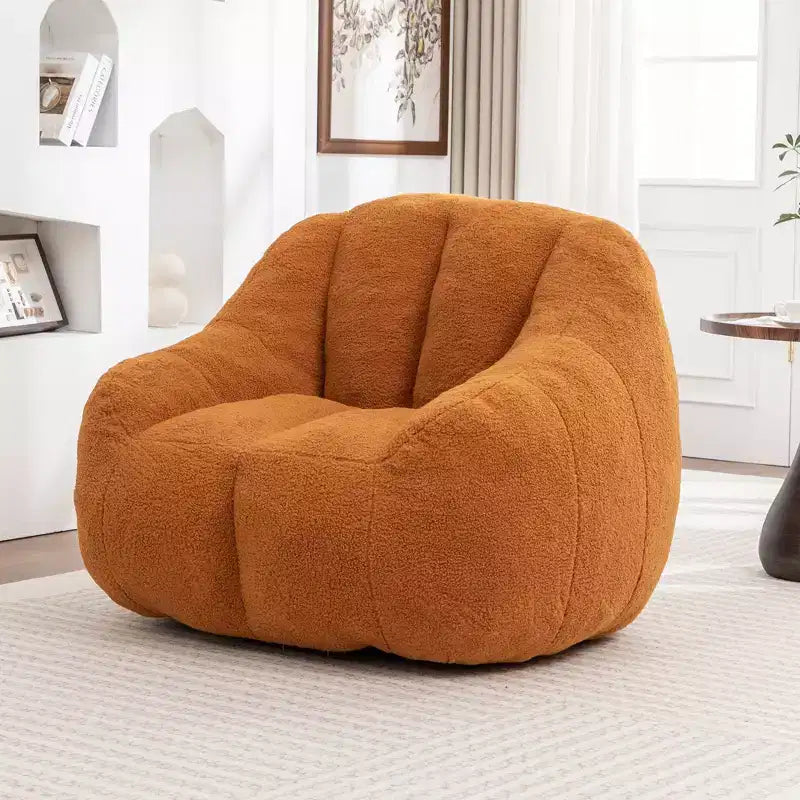 Poltrona lounge in morbido tessuto Teddy, poltrona di design in peluche con forma arrotondata per soggiorno, camera da letto o angolo lettura