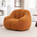 Poltrona lounge in morbido tessuto Teddy, poltrona di design in peluche con forma arrotondata per soggiorno, camera da letto o angolo lettura
